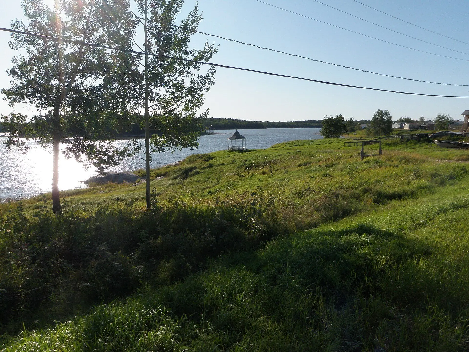 Lakeshore with gazebo and houses